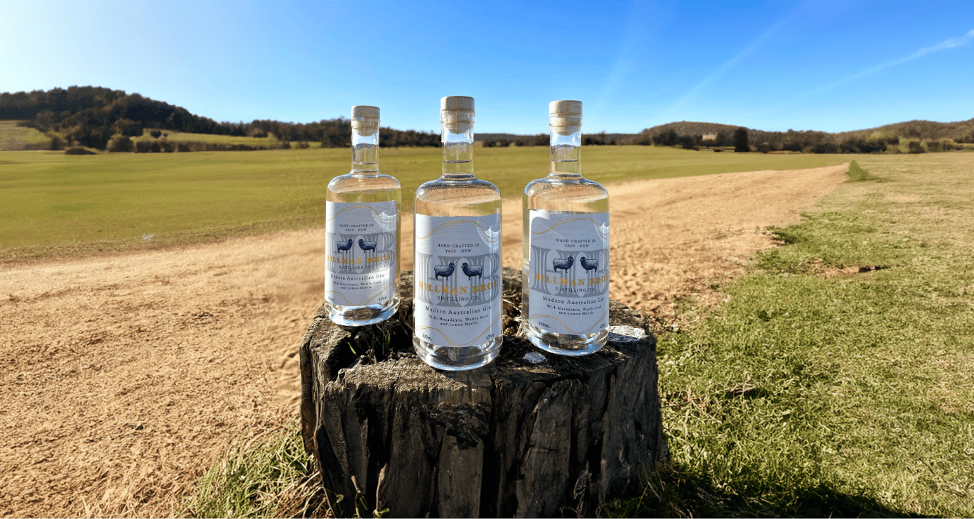 three white gin bottles